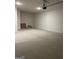 Spacious two car garage with sealed concrete flooring and overhead lighting at 3706 Cheswoilde Ave # 96, Powder Springs, GA 30127