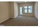 Spacious carpeted living room with lots of natural light at 3706 Cheswoilde Ave # 96, Powder Springs, GA 30127