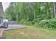 Private backyard with a paver patio, ideal for entertaining and relaxation at 702 Brambling Way, Stockbridge, GA 30281