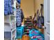 Well-organized walk-in closet with shelves and hanging space, plus additional laundry baskets at 702 Brambling Way, Stockbridge, GA 30281