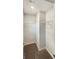 Bright walk-in closet with carpeted floor and wire shelving, offering ample storage space at 376 Layfield Dr, Jonesboro, GA 30238