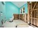 Partially renovated bathroom showing new plywood floors, opened up walls and new drywall at 1213 Laurel Cliff Se Dr, Smyrna, GA 30082