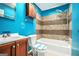 Cozy bathroom featuring tiled shower and tub, sleek vanity, and new toilet at 1213 Laurel Cliff Se Dr, Smyrna, GA 30082