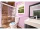 Updated bathroom with tiled shower, modern vanity, sleek fixtures, and natural light at 1213 Laurel Cliff Se Dr, Smyrna, GA 30082