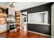 Charming kitchen featuring stainless steel appliances, wood accents, and ample cabinet space at 1213 Laurel Cliff Se Dr, Smyrna, GA 30082