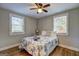 Bright bedroom with hardwood floors and large windows at 3464 Wren Rd, Decatur, GA 30032