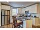 Bright kitchen with granite countertops, stainless steel appliances, and counter seating at 3464 Wren Rd, Decatur, GA 30032