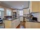 Open kitchen featuring stainless steel appliances, granite countertops, and hardwood floors at 3464 Wren Rd, Decatur, GA 30032
