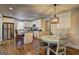 Bright kitchen featuring stainless steel appliances, granite countertops, and hardwood floors at 3464 Wren Rd, Decatur, GA 30032