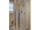 Modern shower with glass door and white tile surround at 3464 Wren Rd, Decatur, GA 30032