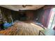 Basement featuring paneled walls, wood flooring, and a walkout to the backyard at 402 Emmett St, Riverdale, GA 30274