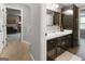 Well-lit bathroom features a vanity with ample storage and mirror at 31 Butler Bridge Dr, Mcdonough, GA 30252