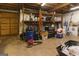 Garage with a variety of tools and equipment on shelves and on the floor at 31 Butler Bridge Dr, Mcdonough, GA 30252