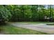 Private, tree-lined backyard offers a serene setting and plenty of space at 31 Butler Bridge Dr, Mcdonough, GA 30252