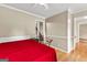 A well-lit bedroom with wood-look floors and neutral wall color at 155 Grandview Trce, Fayetteville, GA 30215