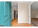 Open foyer showcasing hardwood floors and a staircase leading to the upper level at 155 Grandview Trce, Fayetteville, GA 30215