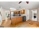 Open kitchen and dining area with modern appliances and generous counter space for cooking and entertaining at 155 Grandview Trce, Fayetteville, GA 30215