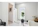 Bright bathroom with white tile, large window, and modern decor accents at 109 Old Virginia Cir, Jonesboro, GA 30236