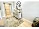 Open foyer featuring hardwood floors, a sliding barn door, and decorative accents at 109 Old Virginia Cir, Jonesboro, GA 30236