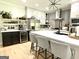 Modern kitchen with stainless steel appliances and a stylish island with seating at 109 Old Virginia Cir, Jonesboro, GA 30236