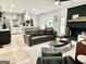 Open concept living room seamlessly connects to the kitchen, creating an inviting space at 109 Old Virginia Cir, Jonesboro, GA 30236