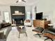 Spacious living room with modern fireplace and cozy seating area at 109 Old Virginia Cir, Jonesboro, GA 30236