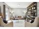Inviting living room with stylish bookshelf, comfortable seating, and a cozy atmosphere at 109 Old Virginia Cir, Jonesboro, GA 30236