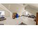Spacious bonus room with neutral carpeting and paint with some furniture and decor at 12 Connie Trl, Grantville, GA 30220