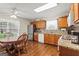 Eat-in kitchen with modern stainless steel appliances, updated counters and floors, and natural light at 12 Connie Trl, Grantville, GA 30220