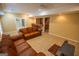 Finished basement featuring ample seating and wet bar at 105 Kellens Ct, Fayetteville, GA 30215