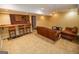 Basement featuring a bar, seating, and entertainment area at 105 Kellens Ct, Fayetteville, GA 30215