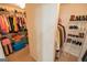 Walk-in closet with shelving and clothing racks for optimal storage at 105 Kellens Ct, Fayetteville, GA 30215
