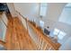 Open foyer has hardwood floors, second-story view to the living room at 105 Kellens Ct, Fayetteville, GA 30215