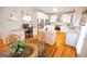 Bright kitchen featuring white cabinets, stainless steel appliances, and granite countertops, blending style and functionality at 105 Kellens Ct, Fayetteville, GA 30215