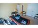 Bright office space featuring a desk, chair and lamp at 105 Kellens Ct, Fayetteville, GA 30215