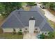 Aerial view showcasing the home's well-maintained roof and landscaping at 1129 River Green Ct, Mcdonough, GA 30252