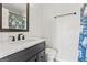 Nautical themed bathroom with a single sink vanity, white marble top and a lighthouse themed shower curtain at 84 Contour Dr, Stockbridge, GA 30281