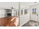 Open living and dining area with fireplace and beautiful hardwood floors at 84 Contour Dr, Stockbridge, GA 30281