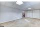 Finished basement area featuring a staircase access and closet storage at 1355 Compton Woods Dr, Loganville, GA 30052
