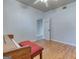 A bright bedroom features a hardwood floor and a piano, offering a cozy atmosphere at 1355 Compton Woods Dr, Loganville, GA 30052