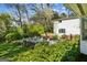 Picture of the backyard featuring a stone patio with a seating arrangement at 1664 W Wesley Nw Rd, Atlanta, GA 30327