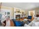 Elegant living room with a fireplace, hardwood floors, and classic decor at 1664 W Wesley Nw Rd, Atlanta, GA 30327