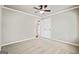 Spacious bedroom with plush carpeting, neutral walls, and a double door closet at 760 Swan Ln, Canton, GA 30115