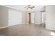Bedroom with wood-look tile floors, a closet, and access to the bathroom at 760 Swan Ln, Canton, GA 30115