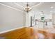 Open dining area with hardwood floors adjoins a kitchen with stainless steel appliances at 760 Swan Ln, Canton, GA 30115