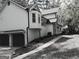 Charming home with a detached garage, lush landscaping, and a welcoming entrance at 760 Swan Ln, Canton, GA 30115