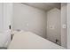 Functional laundry room with a utility sink and ample countertop space at 760 Swan Ln, Canton, GA 30115
