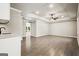 Spacious living room featuring recessed lighting and stylish wood-look tile flooring at 760 Swan Ln, Canton, GA 30115