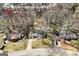 An aerial view of a home with a long drive, and lake nearby at 261 Lakeview Dr, Locust Grove, GA 30248