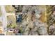 Birds eye view of home, trees, and the water at 261 Lakeview Dr, Locust Grove, GA 30248